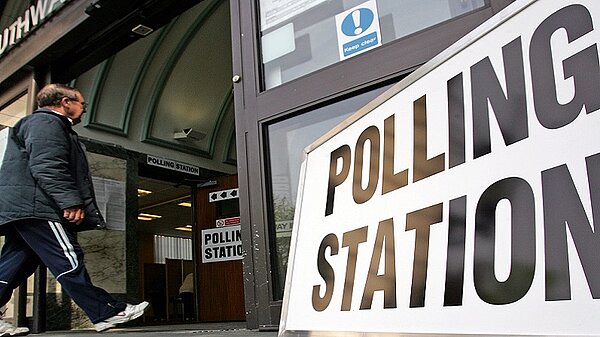 Building entrance with Polling Station sign.