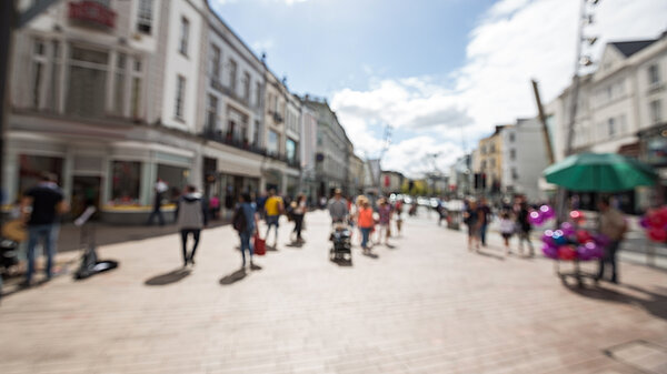 Pedestrians walking in town centre