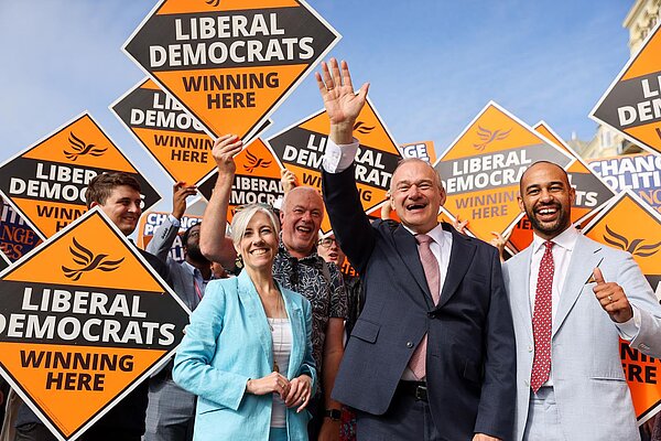 Ed Davey, Daisy Cooper and Josh Babarinde with Lib Dem activists