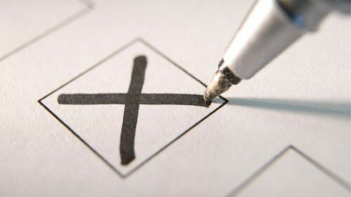 Vote A pen marking an X vote in a box