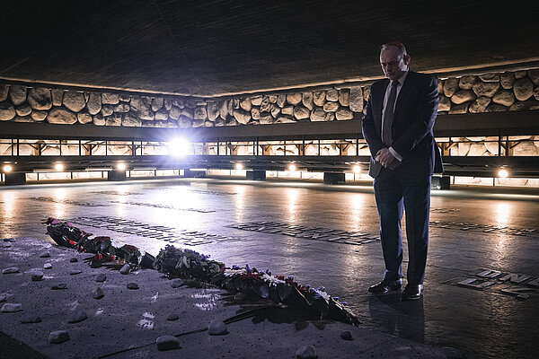 Ed Davey lays wreath at Yad Vashem Ed Davey stands with his hands clasped in front of his body having lain a wreath at Yad Vashem, the Holocaust Memorial