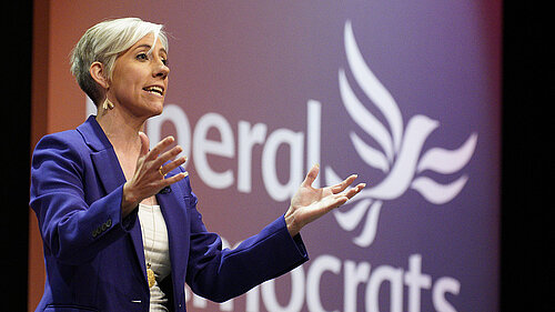 Daisy Cooper MP giving a speech