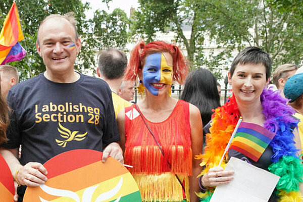 Ed Davey at Pride, wearing a t-shirt with the slogan "I abolished Section 28"