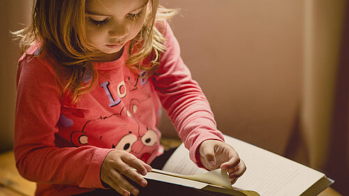 Child reading Girl reading a book