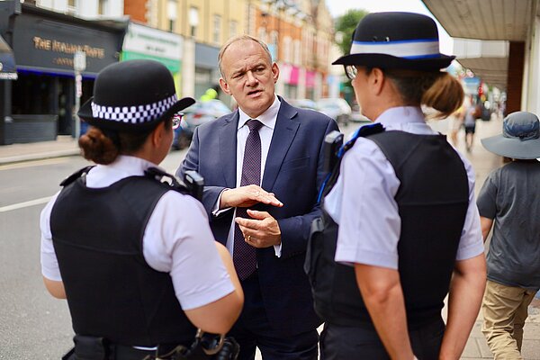 Ed Davey speaks to Police Officers