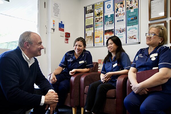 Ed Davey speaks with social care works in Berkshire