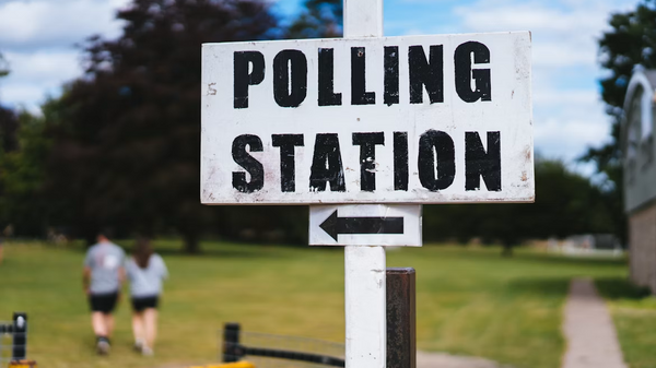 A sign for a polling station