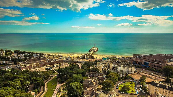 Photo showing the Bournemouth coast in the foreground and sea in the background