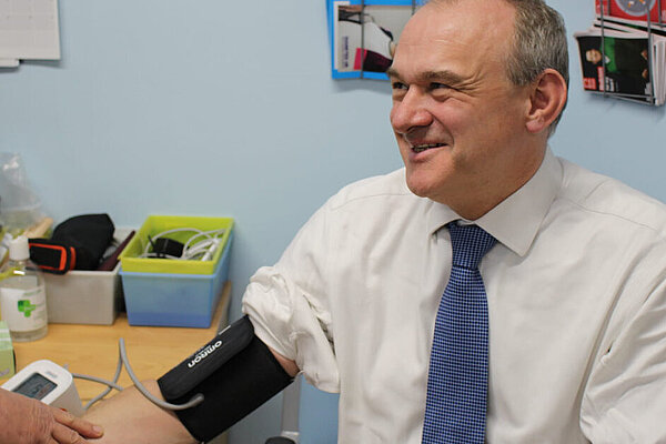 Ed Davey has his blood pressure taken