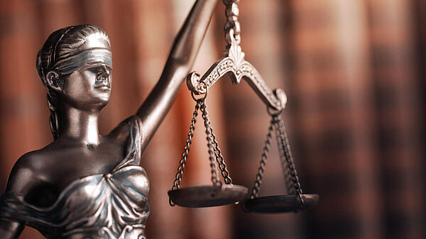 Lady justice - blindfolded and holding the scales of justice