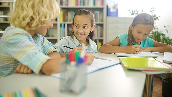 Children at desks in school